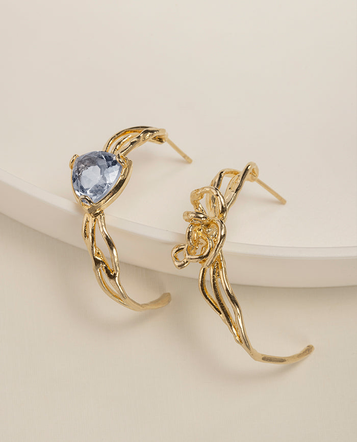 Aretes Uma