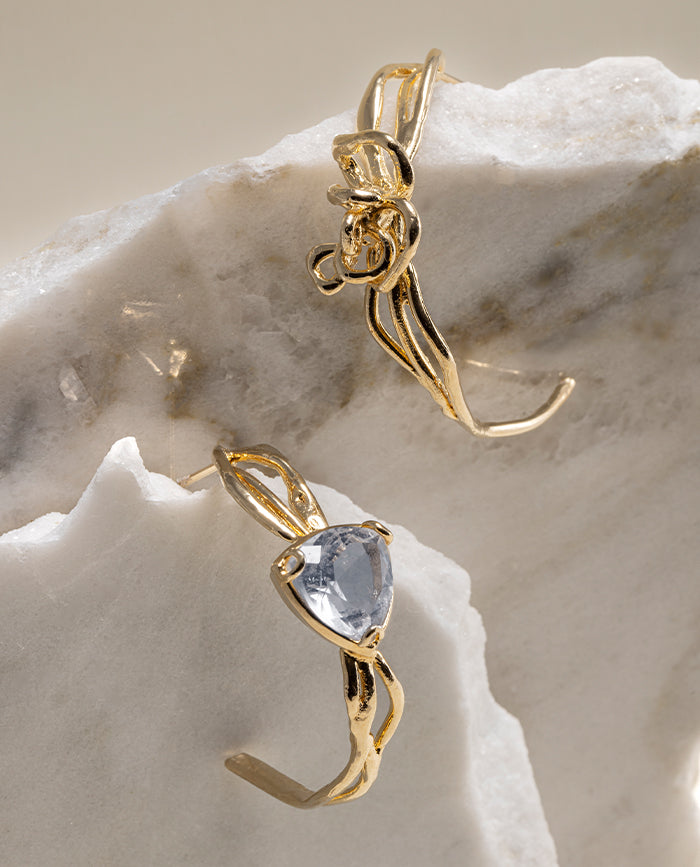 Aretes Uma